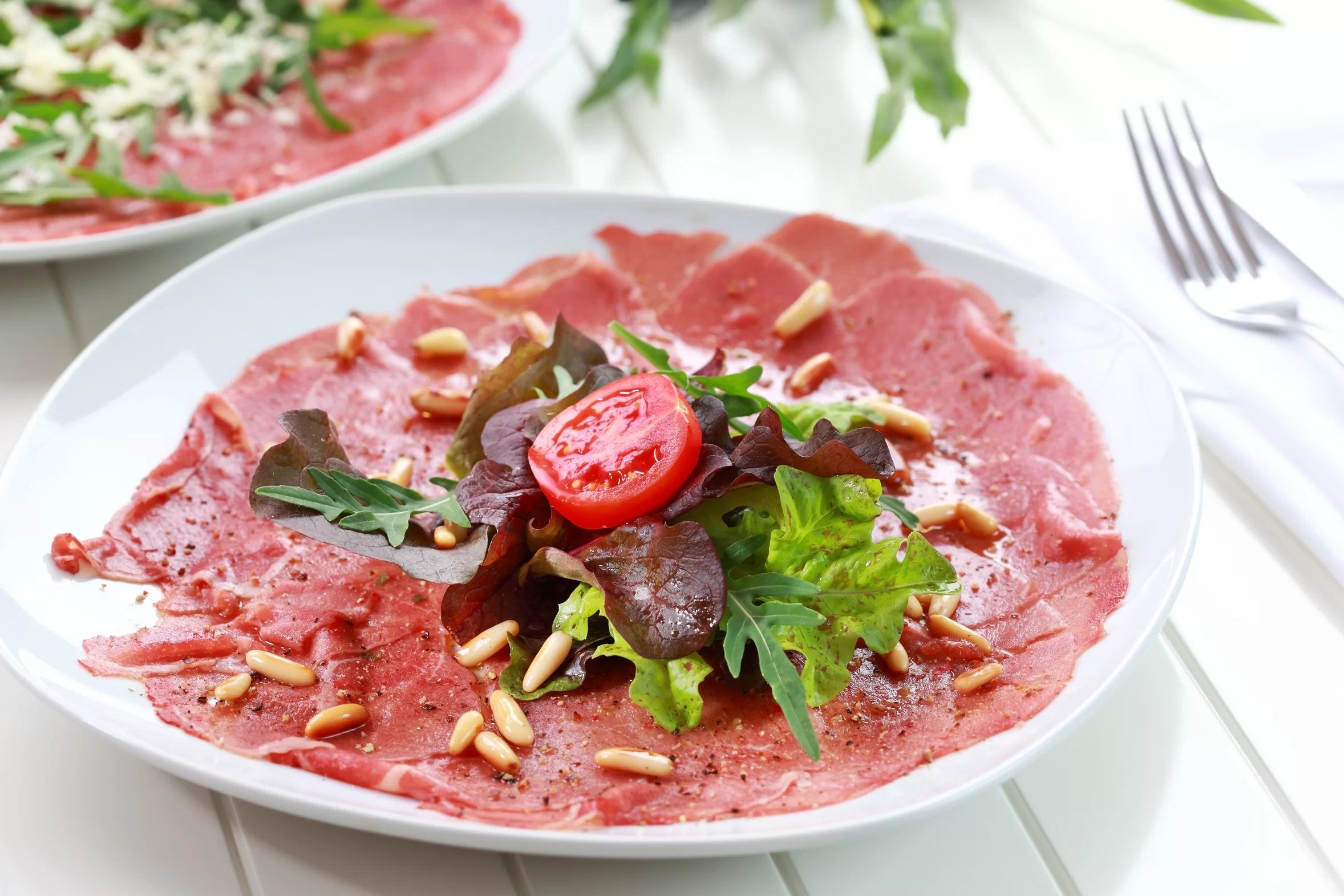 Carpaccio de boeuf aux pignons de pin